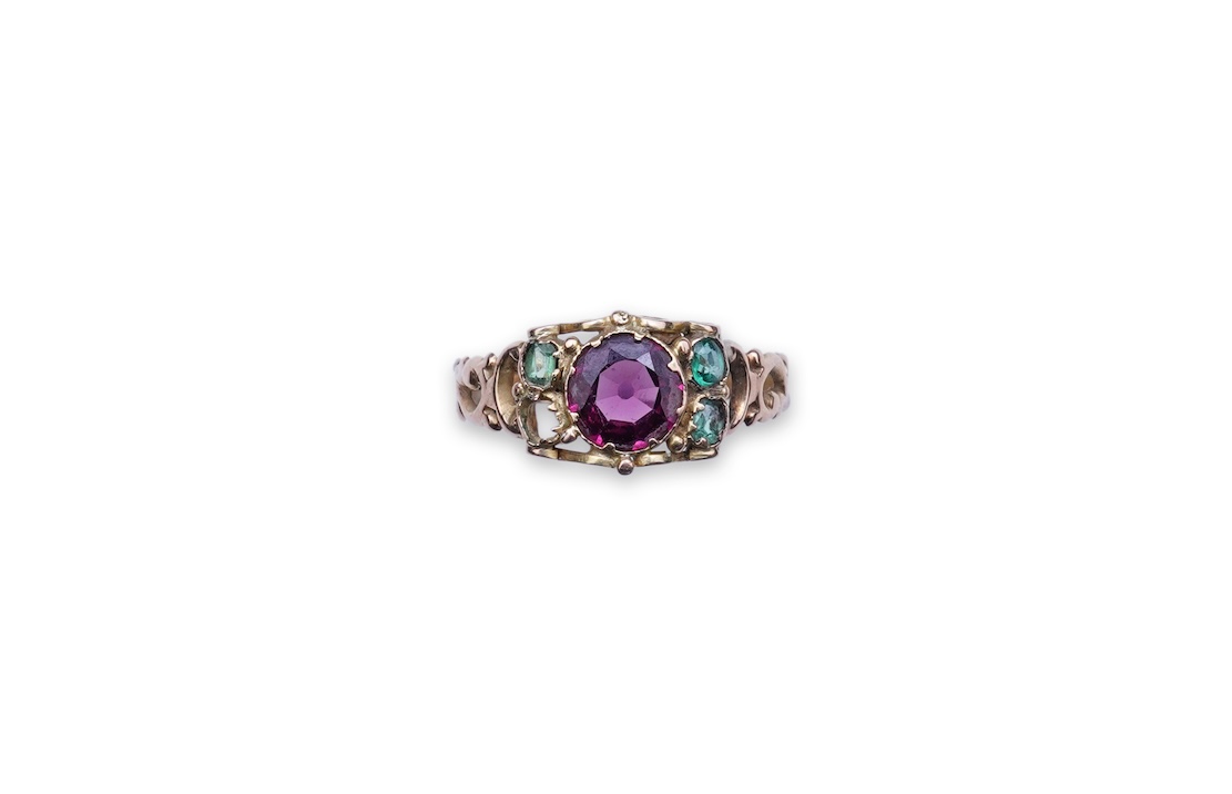 A Victorian garnet and paste ring, circa 1857